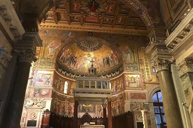 The gold apse mosaics and altar canopy of Santa Maria in Trastevere